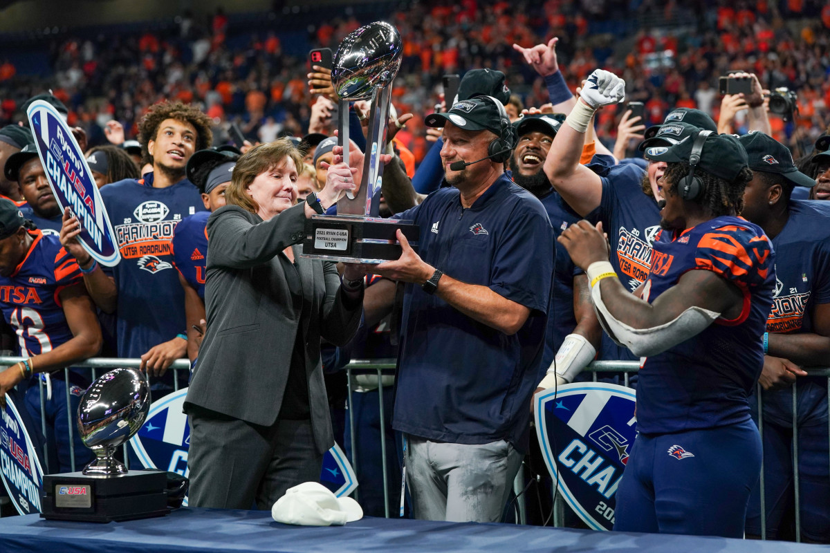 UTSA Roadrunners head coach Jeff Traylor praises MVP running back Sincere McCormick (3) after he 2021 Conference USA Championship Game against the Western Kentucky Hilltoppers at the Alamodome.