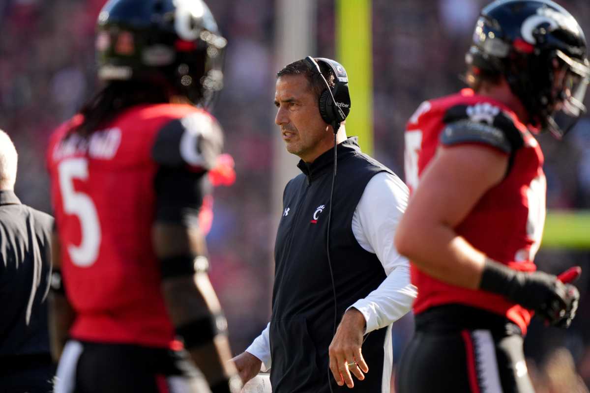 Cincinnati Bearcats head coach Luke Fickell observes as the defense comes off the field in the second quarter of a college football game against the Indiana Hoosiers, Saturday, Sept. 24, 2022, at Nippert Stadium in Cincinnati. Ncaaf Indiana Hoosiers At Cincinnati Bearcats Sept 24 0246
