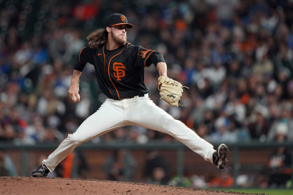 SF Giants pitcher Cole Waites throws a pitch. (2022)