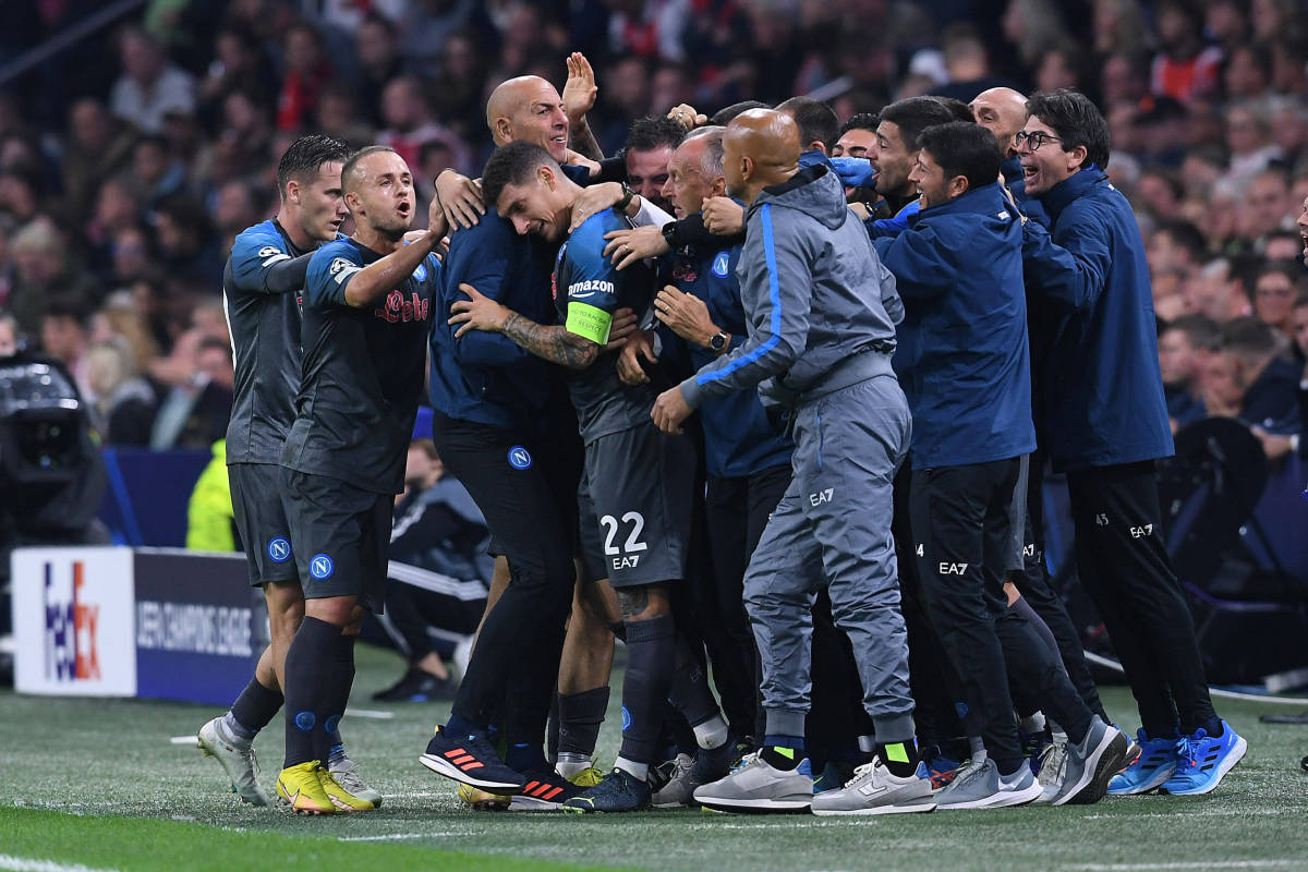 Napoli's players and staff pictured celebrating during a 6-1 win over Ajax in October 2022