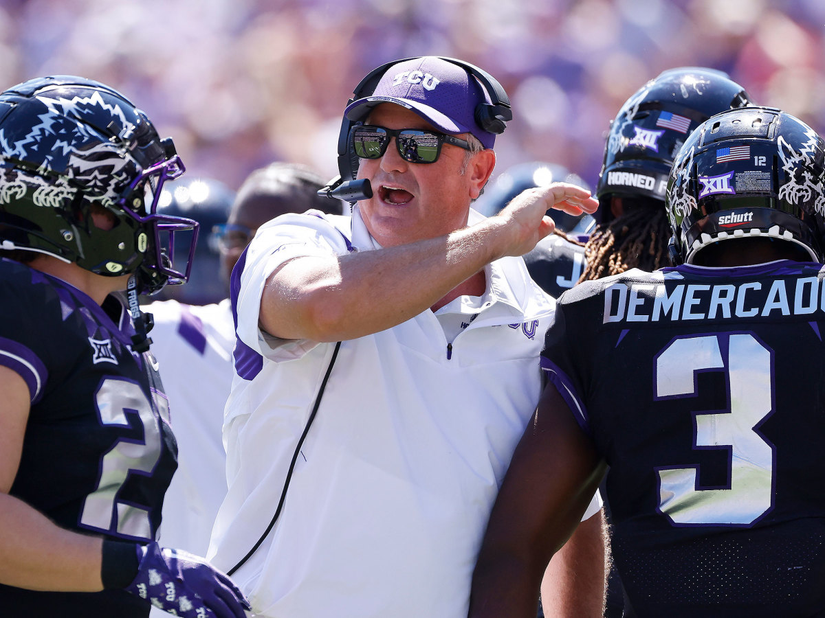 Sonny Dykes and TCU players celebrate a touchdown
