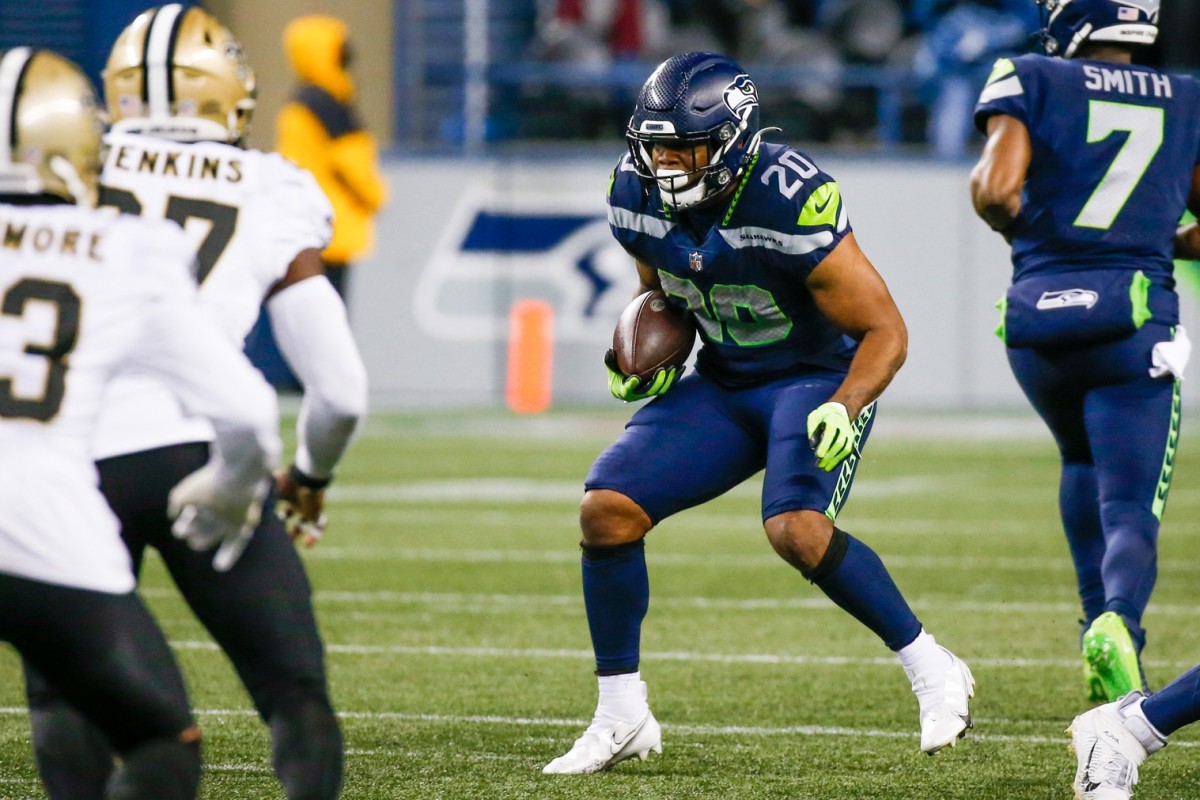 Oct 25, 2021; Seattle Seahawks running back Rashaad Penny (20) rushes against the New Orleans Saints. Mandatory Credit: Joe Nicholson-USA TODAY Sports