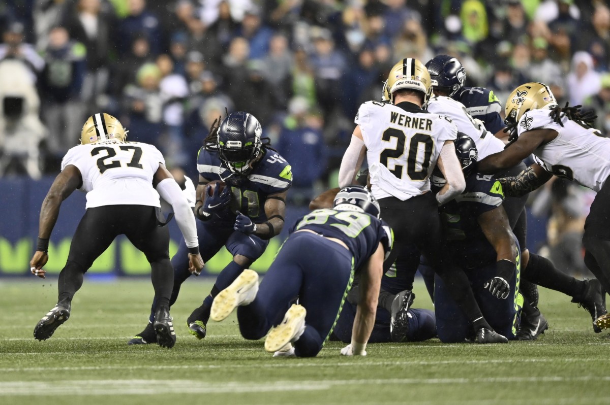 Oct 25, 2021; Seattle Seahawks running back Alex Collins (41) runs against the New Orleans Saints. Mandatory Credit: Steven Bisig-USA TODAY
