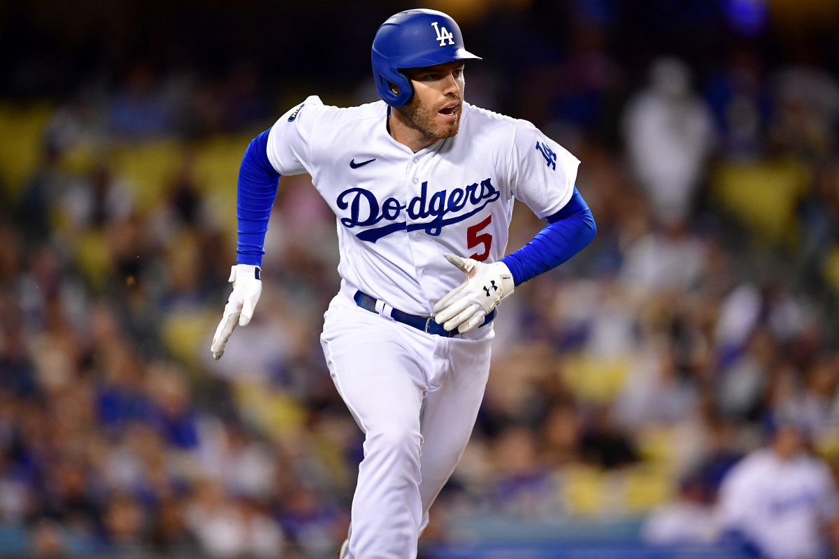 Sep 20, 2022; Los Angeles, California, USA; Los Angeles Dodgers first baseman Freddie Freeman (5) runs after hitting a single against the Arizona Diamondbacks during the sixth inning at Dodger Stadium.