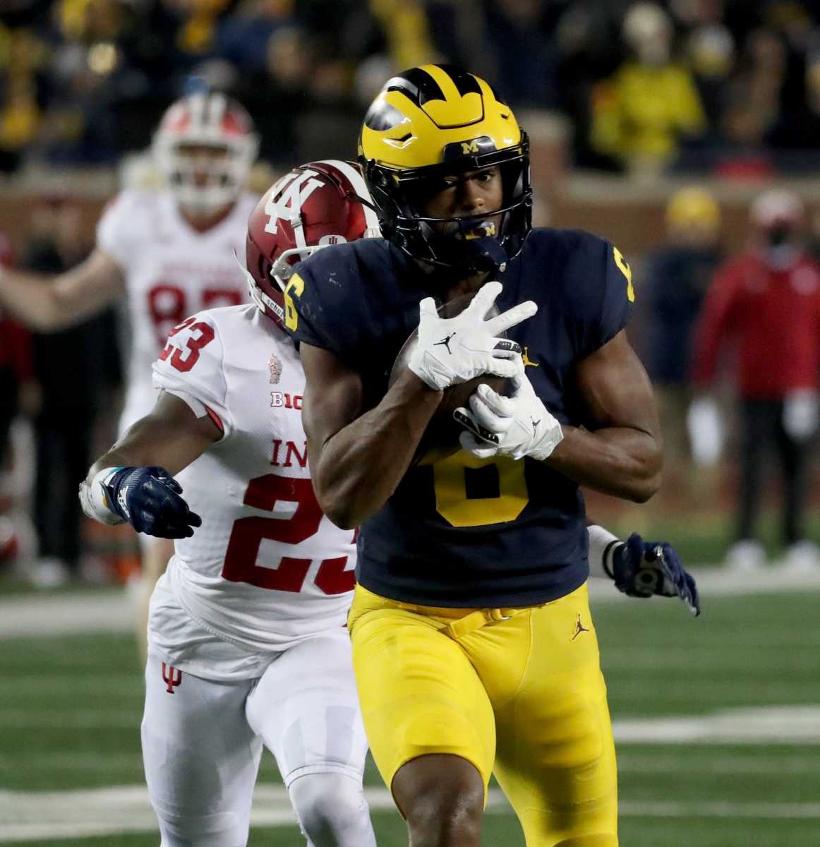 Michigan wide receiver Cornelius Johnson makes a catch against Indiana defensive back Jaylin Williams during the second half of Michigan's 29-7 win on Saturday, Nov. 6, 2021, at Michigan Stadium.