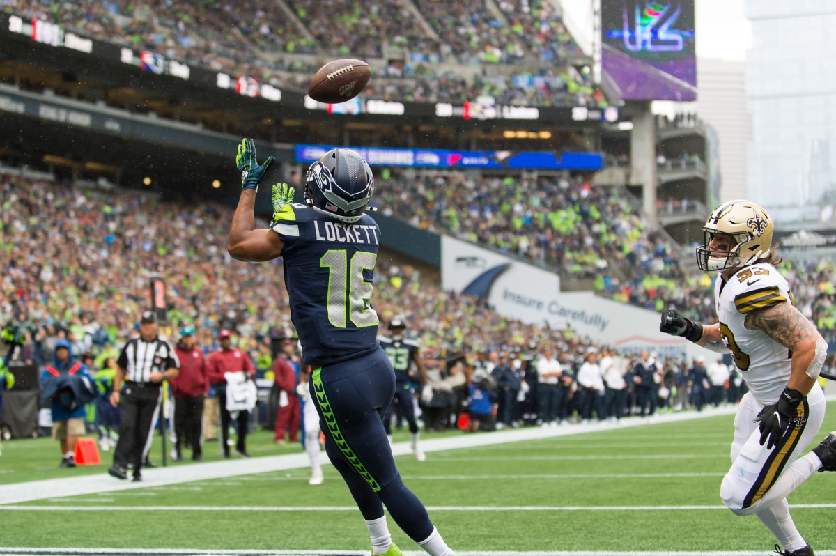 Sep 22, 2019; Seattle Seahawks wide receiver Tyler Lockett (16) catches a touchdown pass against the New Orleans Saints. Mandatory Credit: Steven Bisig-USA TODAY Sports
