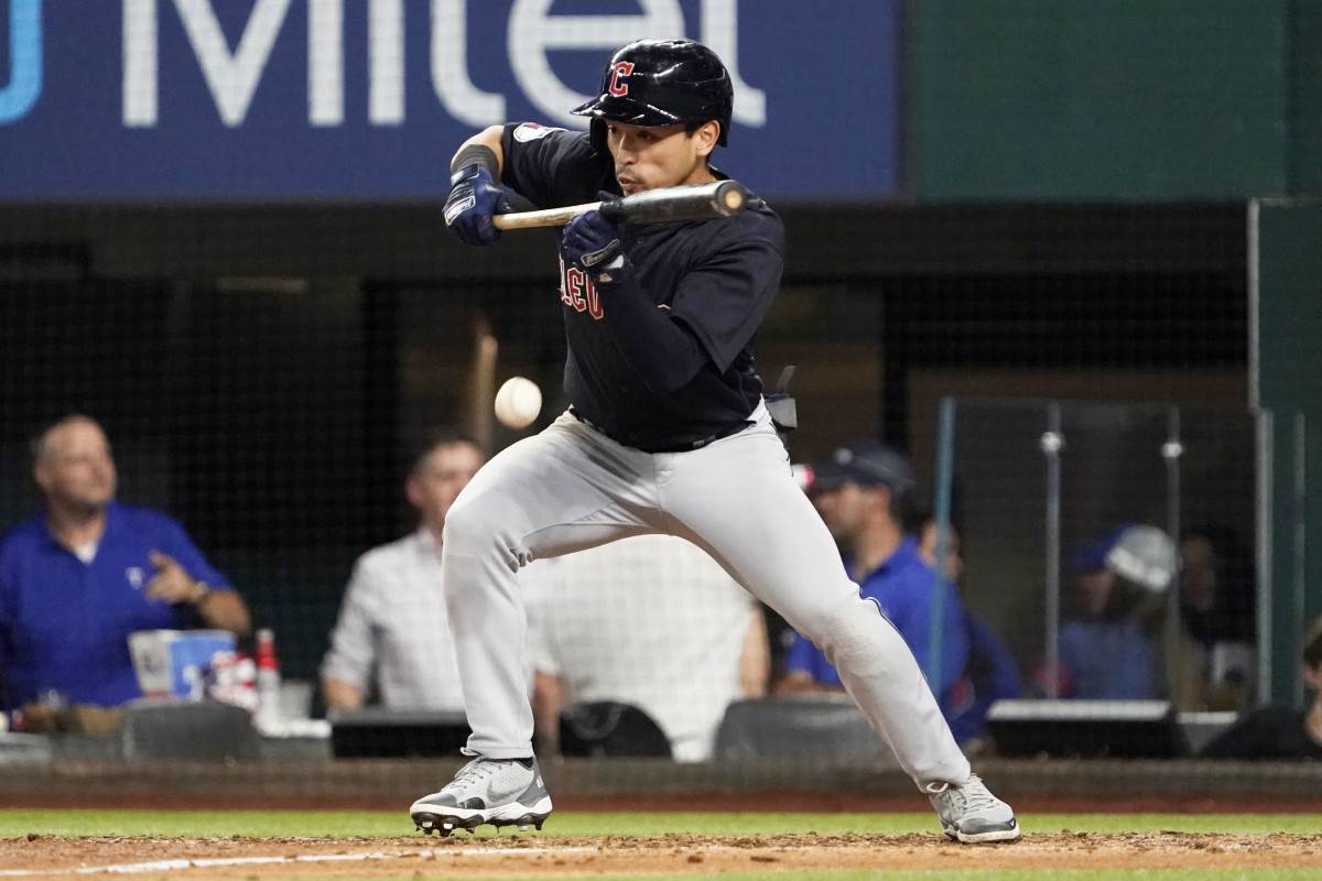 Sep 24, 2022; Arlington, Texas, USA; Cleveland Guardians left fielder Steven Kwan (38) lays down the sacrifice bunt during the eighth inning against the Texas Rangers at Globe Life Field.