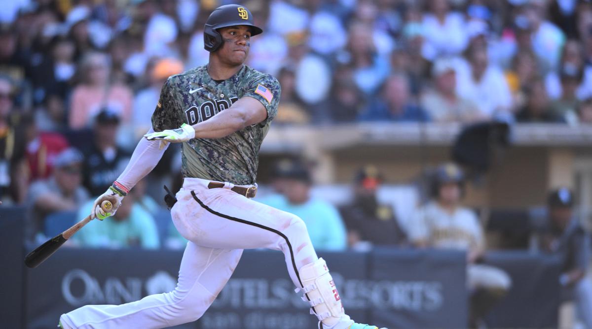 Oct 2, 2022; San Diego, California, USA; San Diego Padres right fielder Juan Soto (22) hits a single against the Chicago White Sox during the eighth inning at Petco Park.