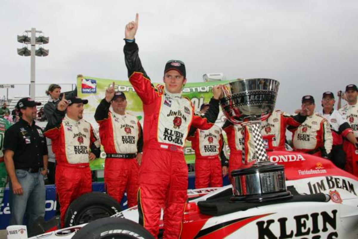 Dan Wheldon celebrates his 2005 IndyCar Championship at Watkins Glen, NY. Photo Courtesy: IndyCar/Ron McQueeney