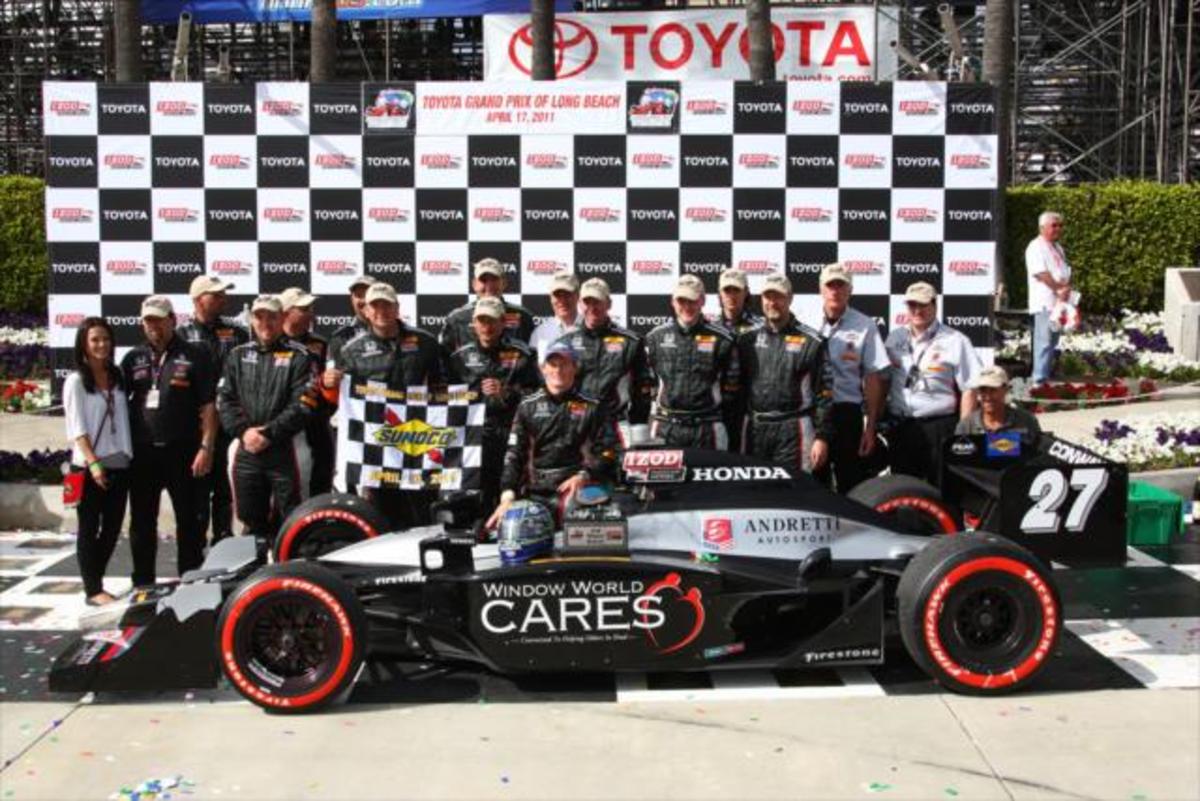 Mike Conway and his Andretti Autosport team celebrate their win at Long Beach. Photo courtesy: IndyCar/Chris Jones