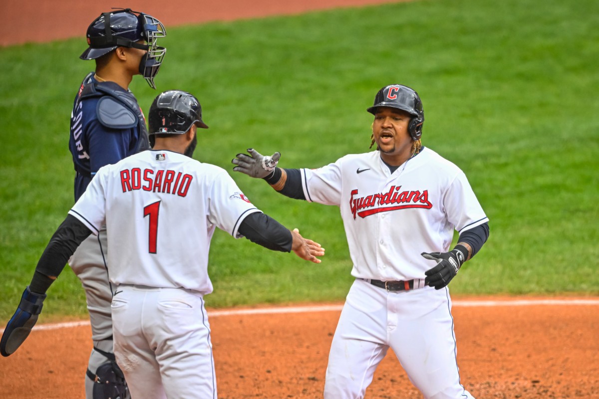 Jose Ramirez (right) hit a two-run homer to beat Tampa Bay in Game 1. (USA TODAY Sports)