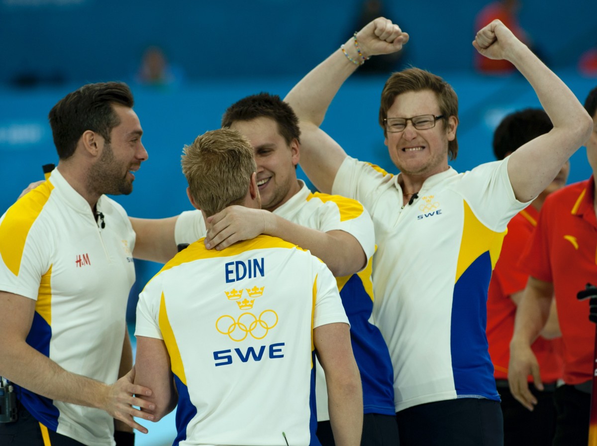 Kjäll celebrates Olympic bronze in 2014 • Michael Burns-Curling Canada