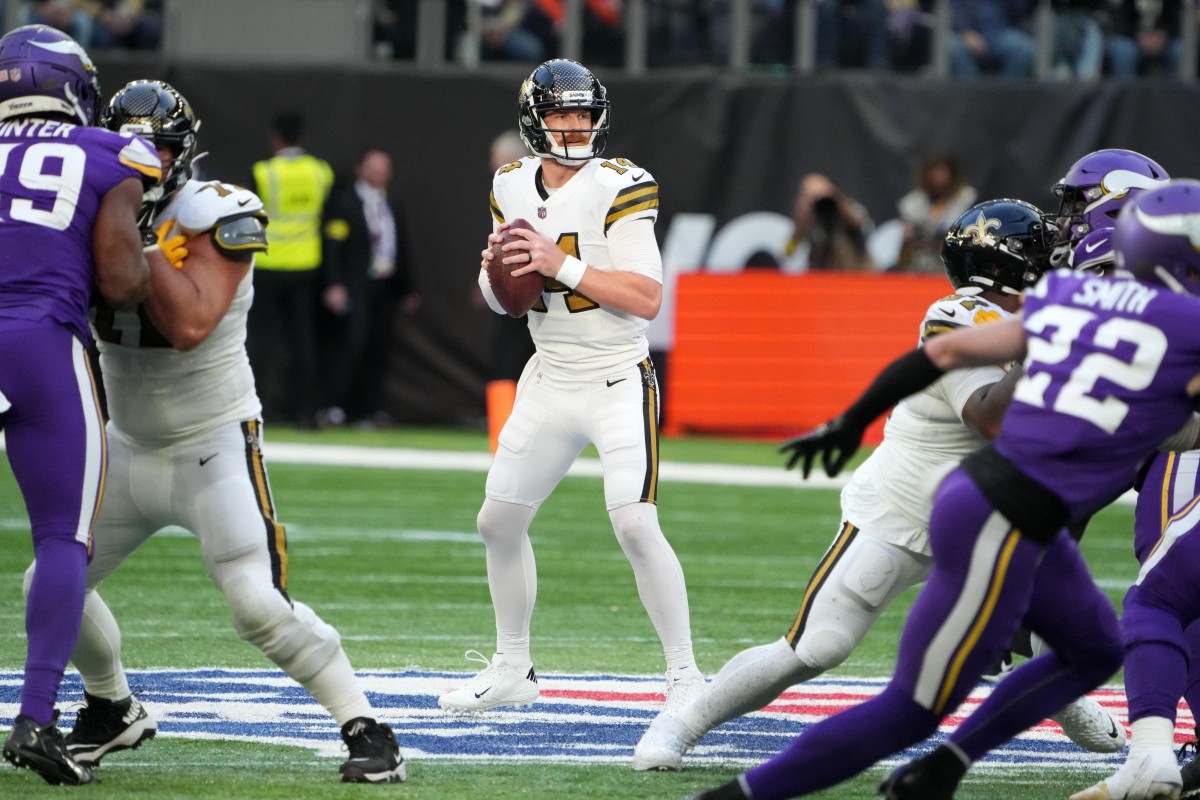 Oct 2, 2022; New Orleans Saints quarterback Andy Dalton (14) throws the ball against the Minnesota Vikings. Mandatory Credit: Kirby Lee-USA TODAY Sports