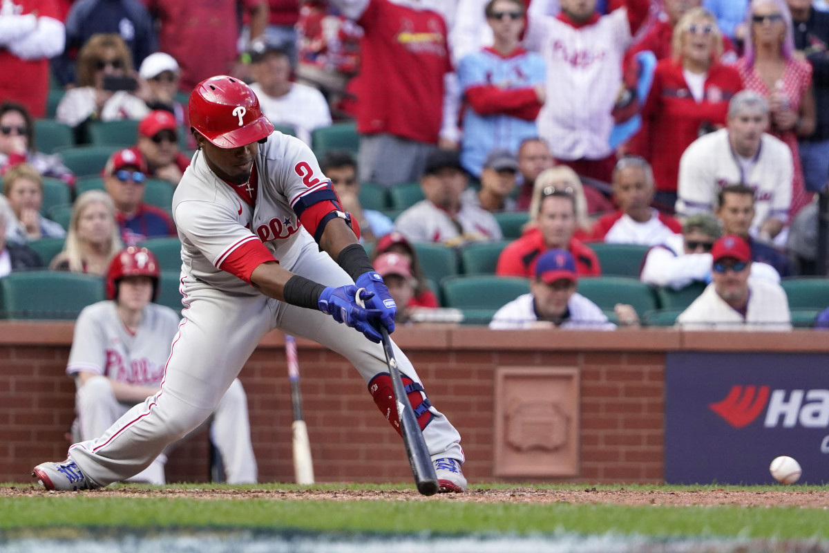 Jean Segura hits a go-ahead, two-run single in the top of the ninth inning against the Cardinals in Game 1 of the NL Wild-Card Series at Busch Stadium.