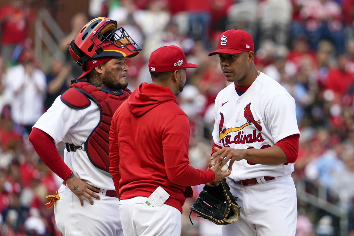 Cardinals manager Oliver Marmol takes out starting pitcher José Quintana in the seventh inning of Game 1 of the NL Wild-Card Series.