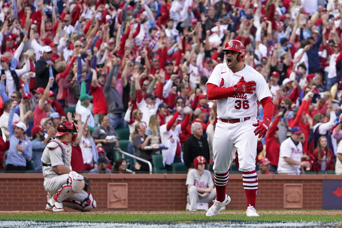 Cardinals rookie Juan Yepez reacts after crushing a go-ahead pinch-hit home run in his career first postseason at bat.