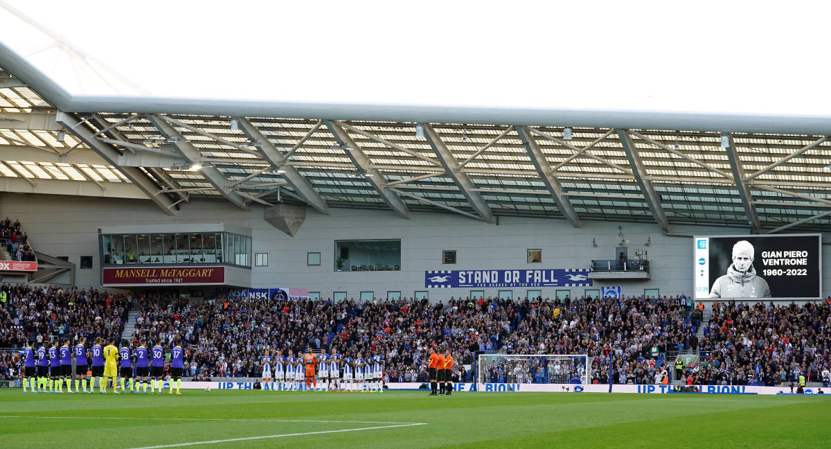 Players from Brighton and Tottenham pictured stood applauding in the center circle at the AMEX Stadium to pay tribute to Gian Piero Ventrone, two days after his death in October 2022
