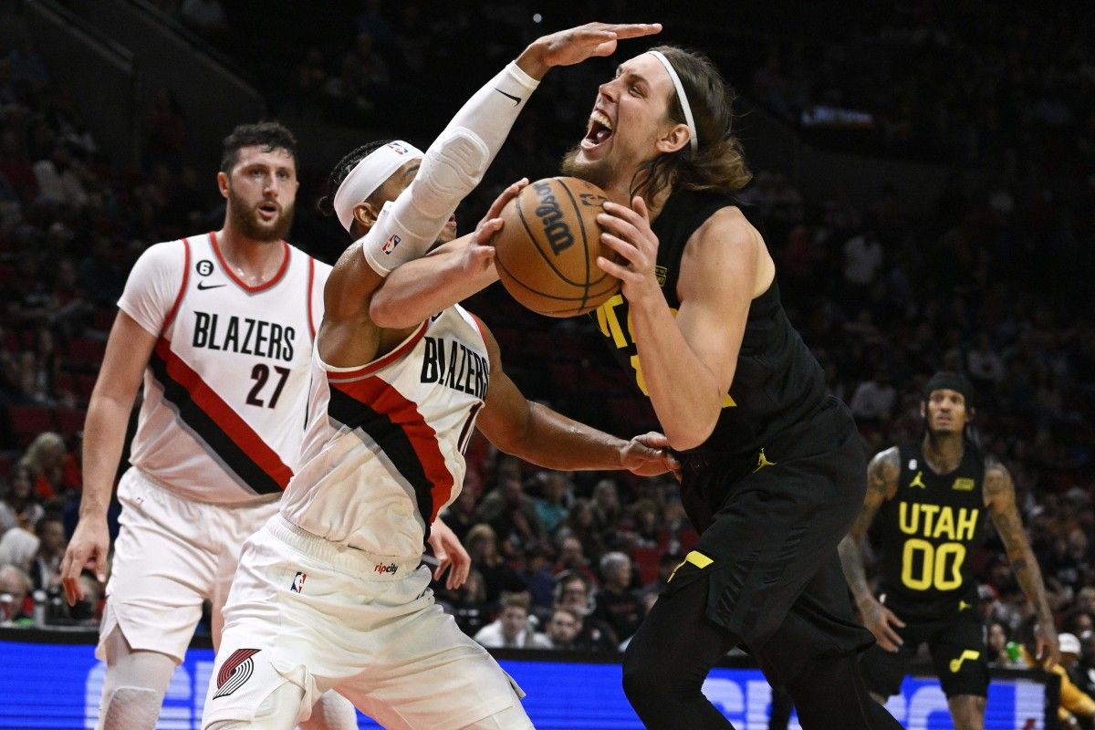 Portland Trail Blazers guard Josh Hart (11) guards Utah Jazz center Kelly Olynyk (41) during the second half at Moda Center. The Jazz won 118-101.