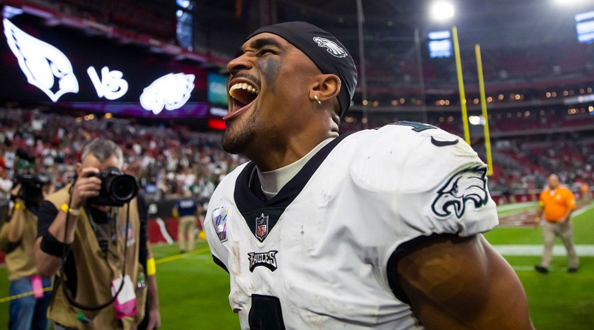 Jalen Hurts screams as he leaves the field with an Eagles win over the Cardinals