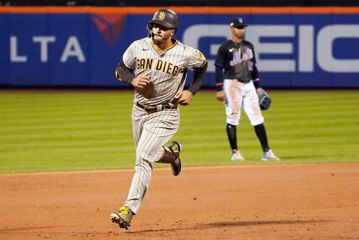 Trent Grisham rounds the bases after hitting a home run off Mets righthander Max Scherzer.
