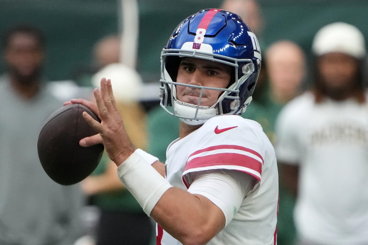 Oct 9, 2022; London, United Kingdom; New York Giants quarterback Daniel Jones (8) throws the ball in the second quarter against the Green Bay Packers during an NFL International Series game at Tottenham Hotspur Stadium.