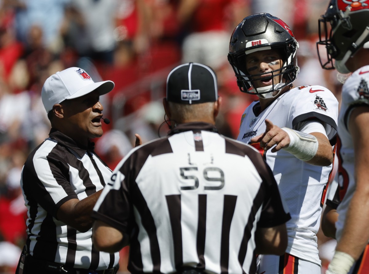 Buccaneers quarterback Tom Brady discusses a call with officials during Week 5 against the Falcons.