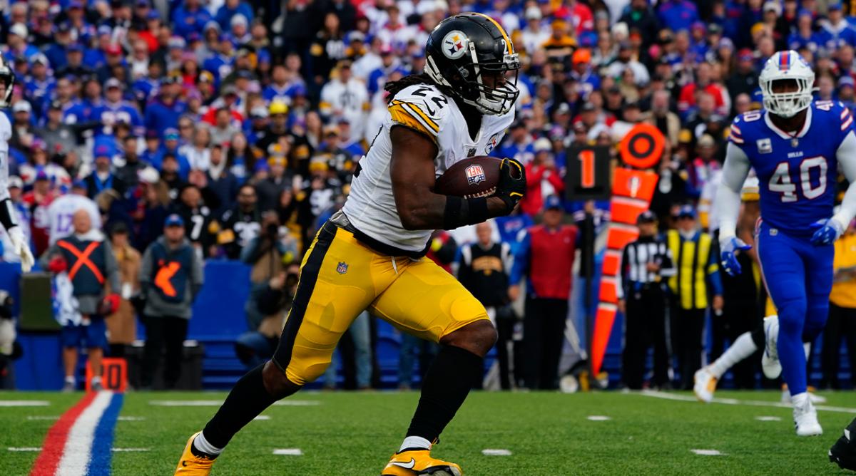 Oct 9, 2022; Orchard Park, New York, USA; Pittsburgh Steelers running back Najee Harris (22) runs with the ball against the Buffalo Bills during the first half at Highmark Stadium.