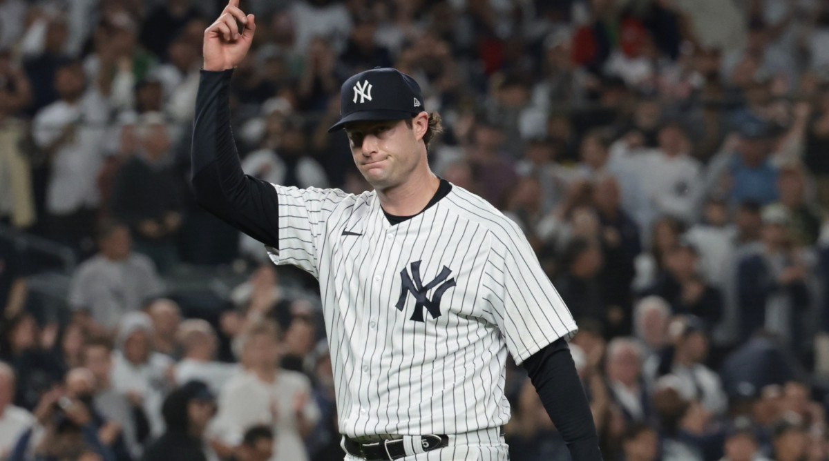 Yankees pitcher Gerrit Cole triumphantly walks off the mound during his ALDS Game 1 start against the Guardians