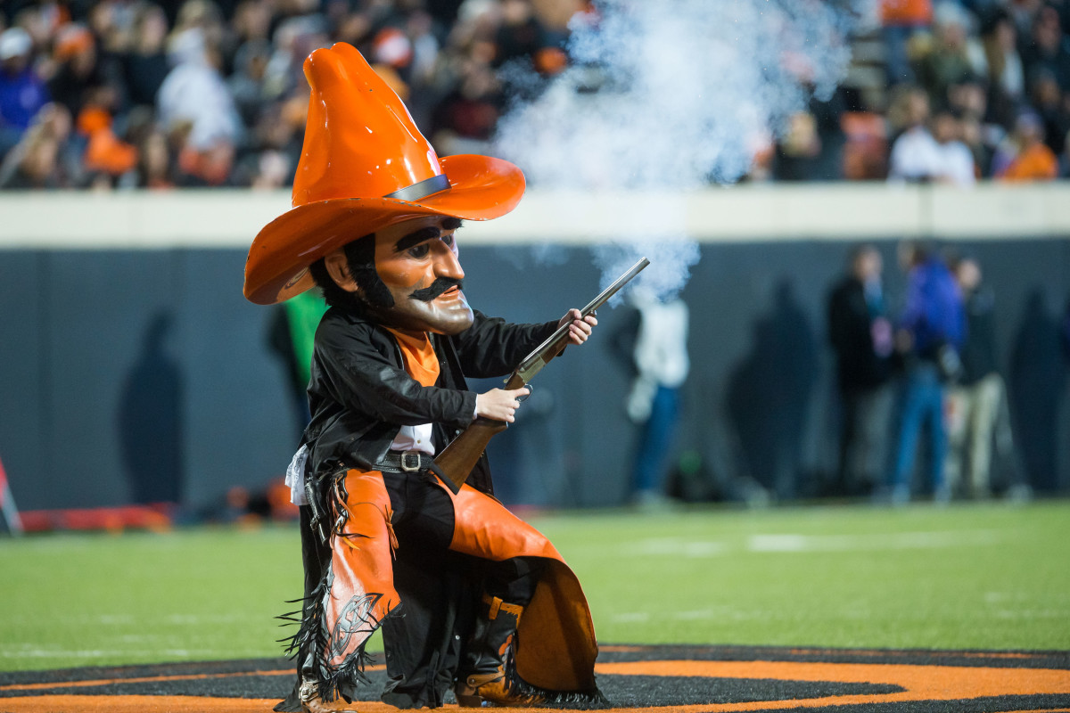 Nov 13, 2021; Stillwater, Oklahoma, USA; Oklahoma State Cowboys Pistol Pete fires his gun before the game against the TCU Horned Frogs at Boone Pickens Stadium. OSU won 63-17. Mandatory Credit: Brett Rojo-USA TODAY Sports