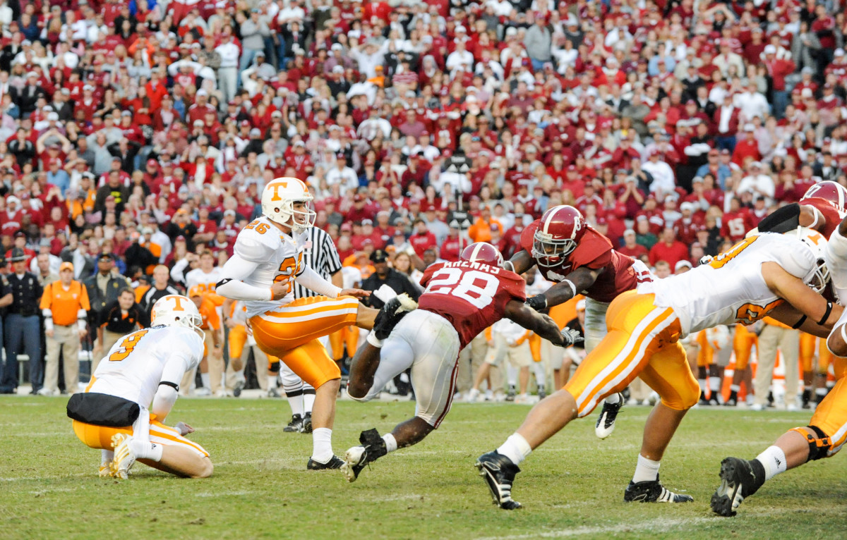 Alabama’s Javier Arenas (28) and Terrance Cody block a field goal from a 2009 game against Tennessee.