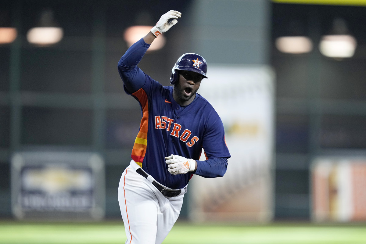 Yordan Alvarez celebrates his two-run home run in Game 2 of the ALDS