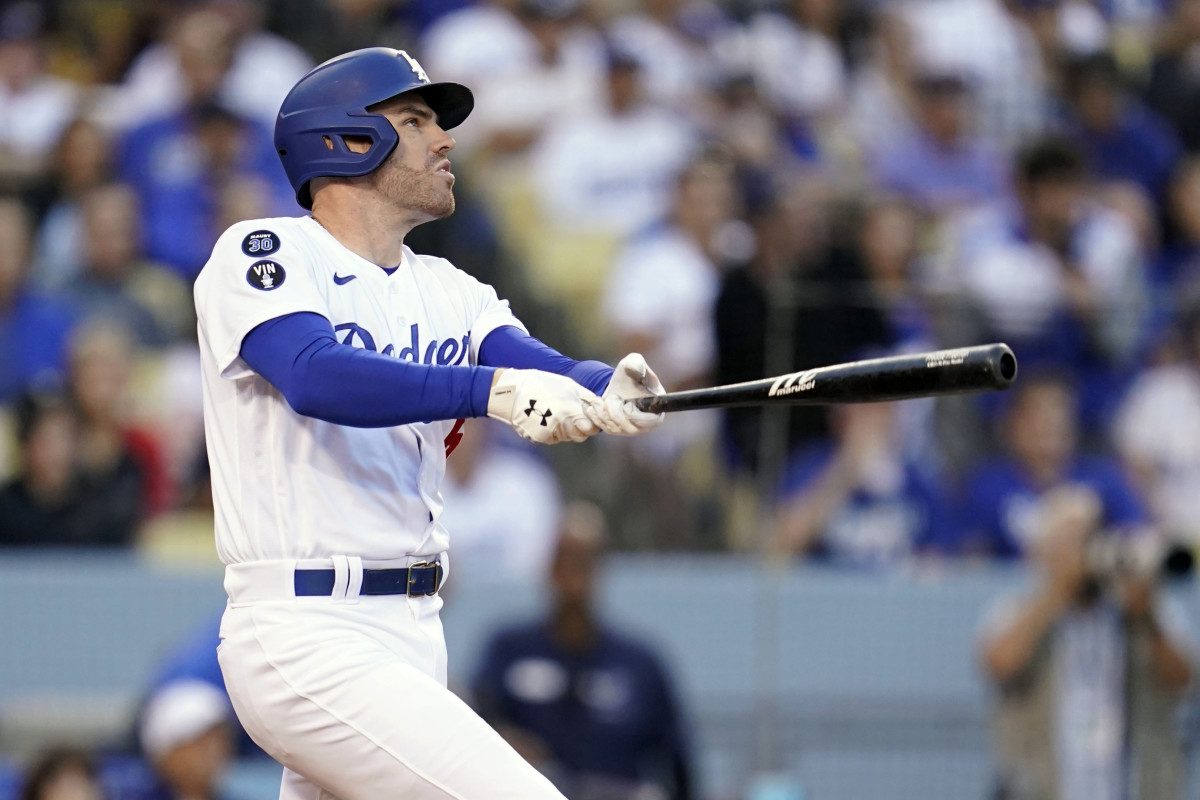 Freddie Freeman hits a home run against the Padres in the NLDS.