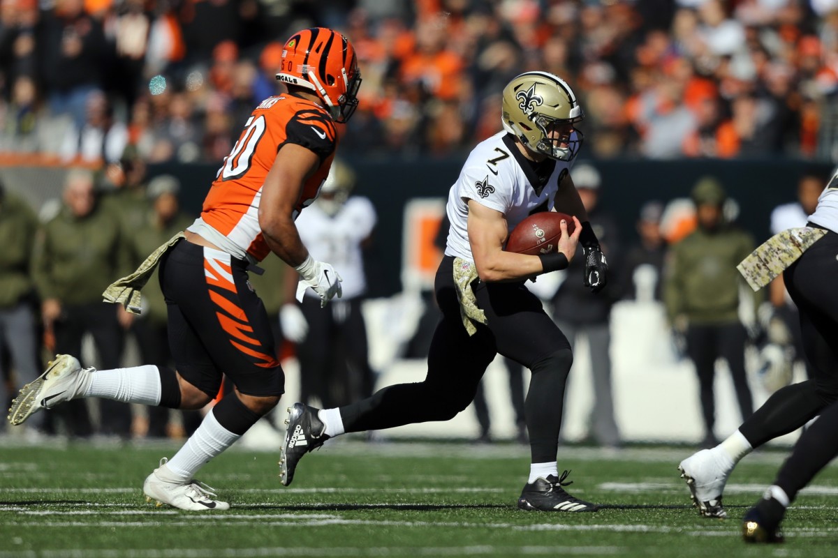 Nov 11, 2018; New Orleans Saints Taysom Hill (7) carries the ball against the Cincinnati Bengals. Mandatory Credit: Aaron Doster-USA TODAY