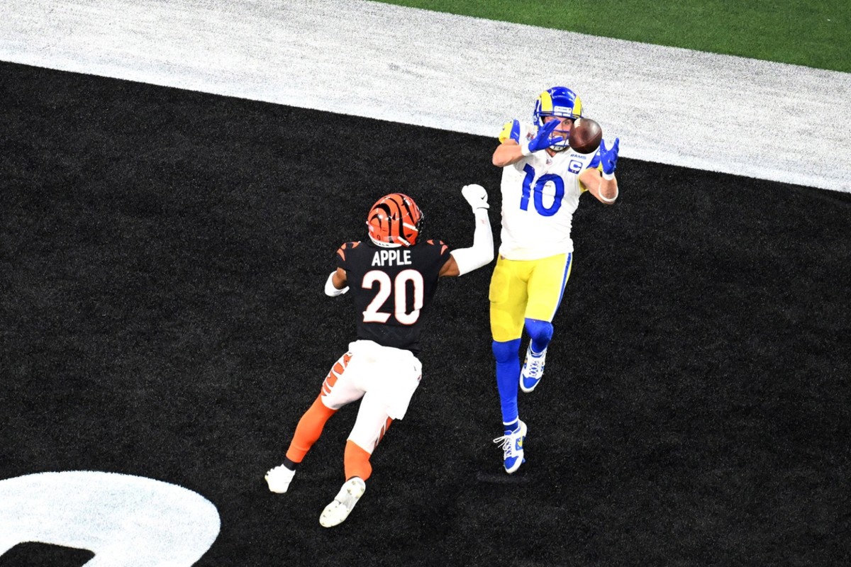 Feb 13, 2022; Los Angeles Rams receiver Cooper Kupp (10) makes a catch for a touchdown against Cincinnati Bengals cornerback Eli Apple (20) in Super Bowl LVI. Mandatory Credit: Richard Mackson-USA TODAY Sports