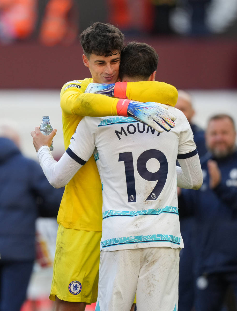 Kepa Arrizabalaga and Mason Mount pictured embracing after starring in Chelsea's 2-0 win at Aston Villa in October 2022