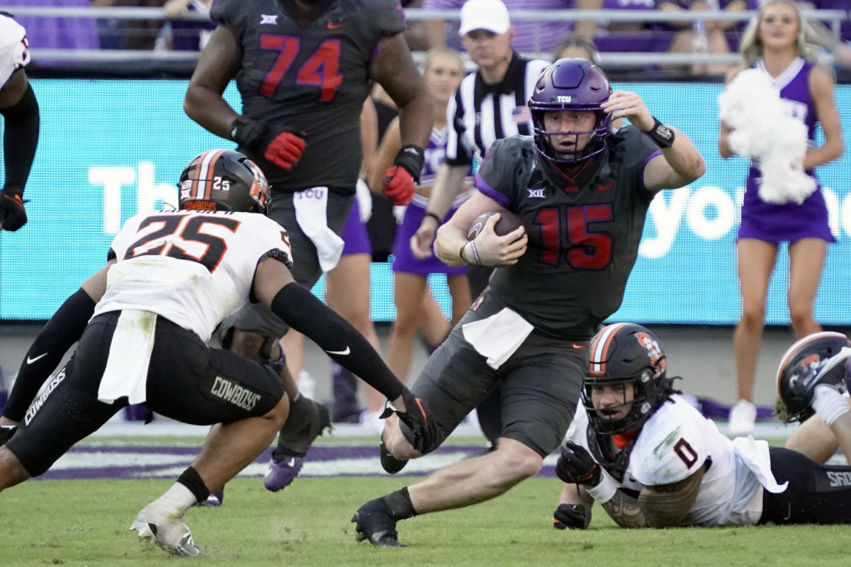 Max Duggan escapes a tackle against Oklahoma State.