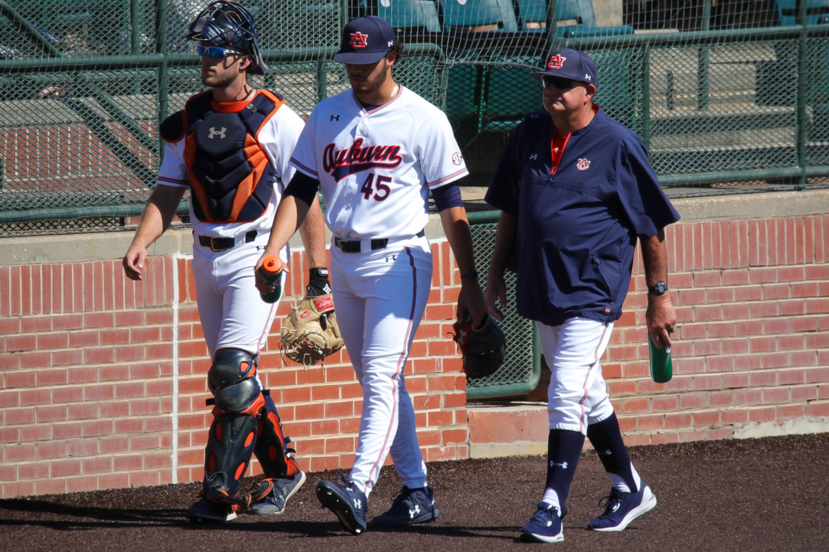 Joseph Gonzalez (45) and Nate LaRue walk from the bullpen to the dugout prior to Auburn's fall exhibition against Louisiana Tech