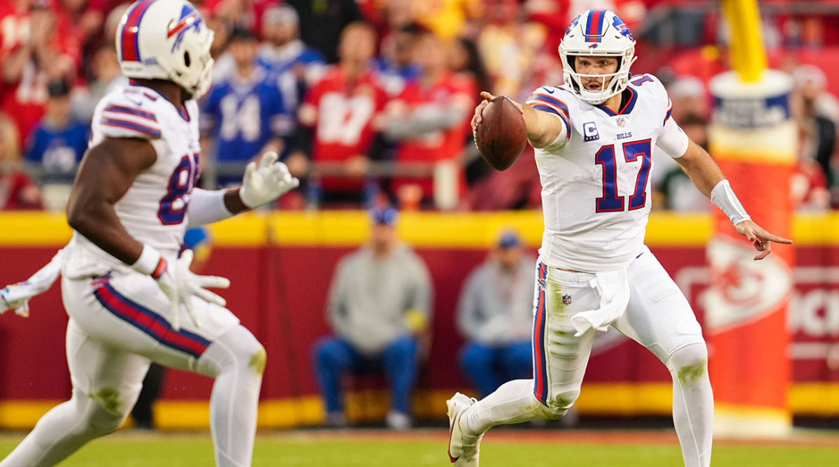 Josh Allen signals to tight end Quintin Morris while running the ball during the second half against the Chiefs.