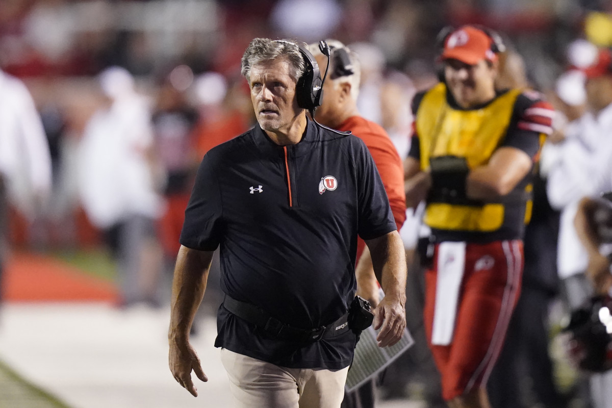 Utah coach Kyle Whittingham walks the sidelines during a game.