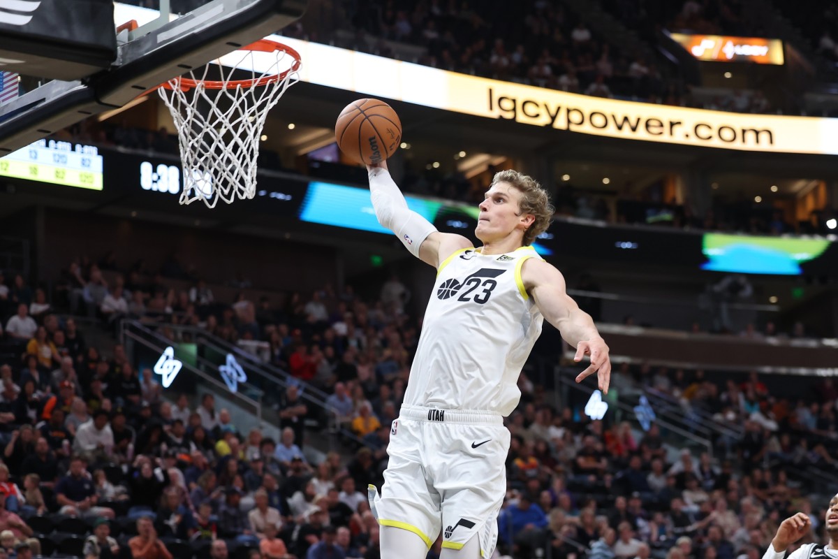 Utah Jazz forward Lauri Markkanen (23) dunks the ball against the San Antonio Spurs in the third quarter at Vivint Arena.