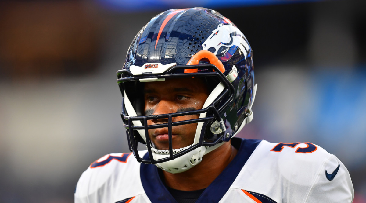 Russell Wilson looks on during Broncos vs. Chargers.