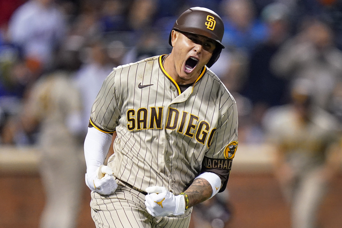 Manny Machado reacts after hitting a home run against the Mets in the NL wild-card series.