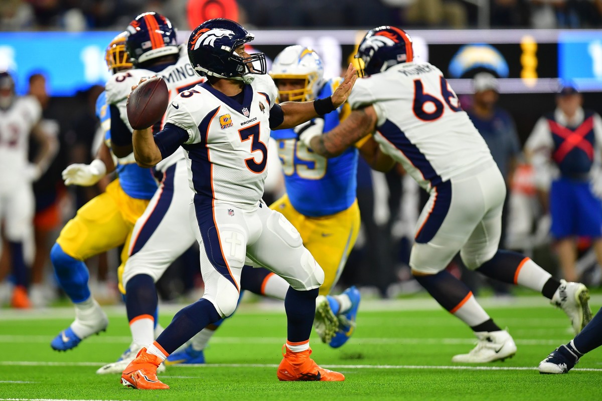 Denver Broncos quarterback Russell Wilson (3) throws against the Los Angeles Chargers during the second half at SoFi Stadium.