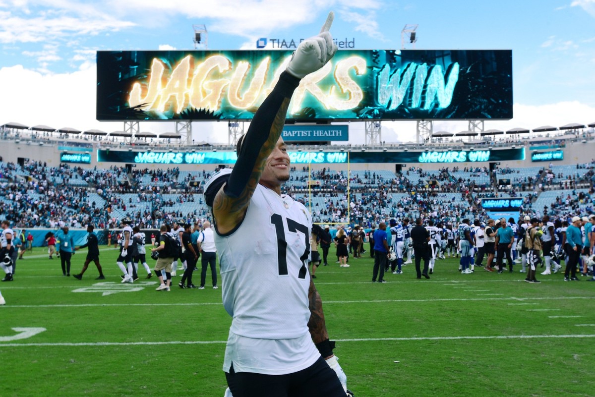 Jacksonville Jaguars tight end Evan Engram (17) points to the fans in the stands as he walks off the field following the team's shutout victory over the Colts. The Jaguars went into the first half with a 17 to 0 lead over the Colts and went on to win the game 24 to 0. The Jacksonville Jaguars hosted the Indianapolis Colts at TIAA Bank field in Jacksonville, FL Sunday, September 18, 2022.