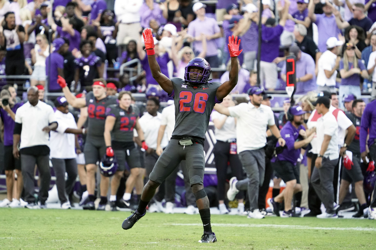 Oct 15, 2022; Fort Worth, Texas, USA; TCU Horned Frogs safety Bud Clark (26) celebrates his interception during the second half against the Oklahoma State Cowboys at Amon G. Carter Stadium. Mandatory Credit: Raymond Carlin III-USA TODAY Sports