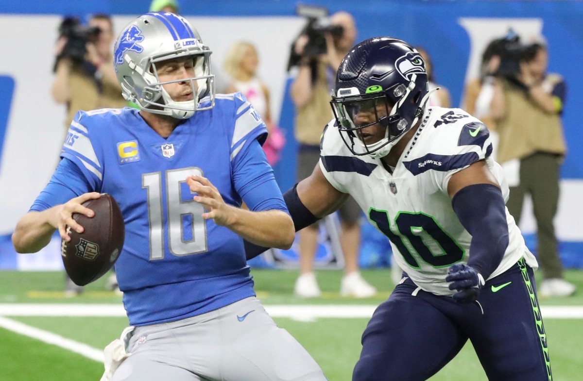 Seattle Seahawks linebacker Uchenna Nwosu rushes Detroit Lions quarterback Jared Goff during the second half at Ford Field,