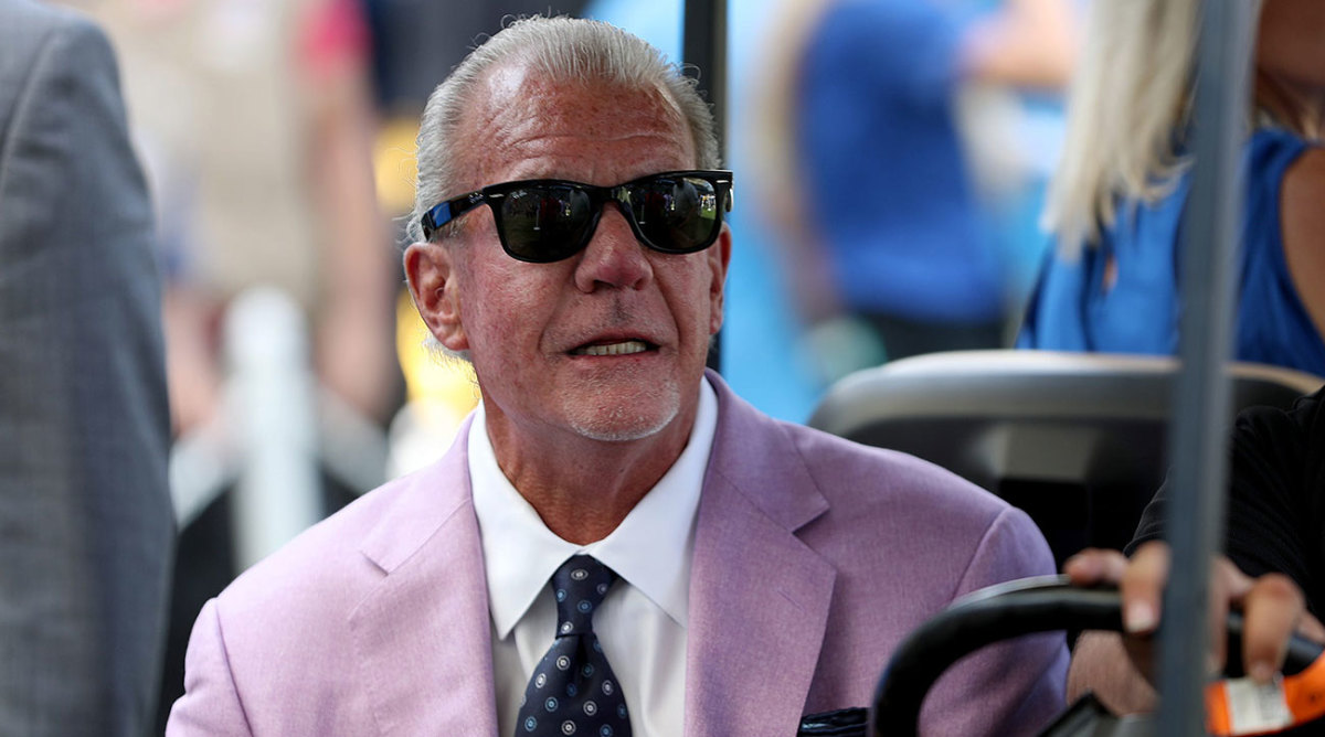 Jim Irsay looks ahead wearing sunglasses.