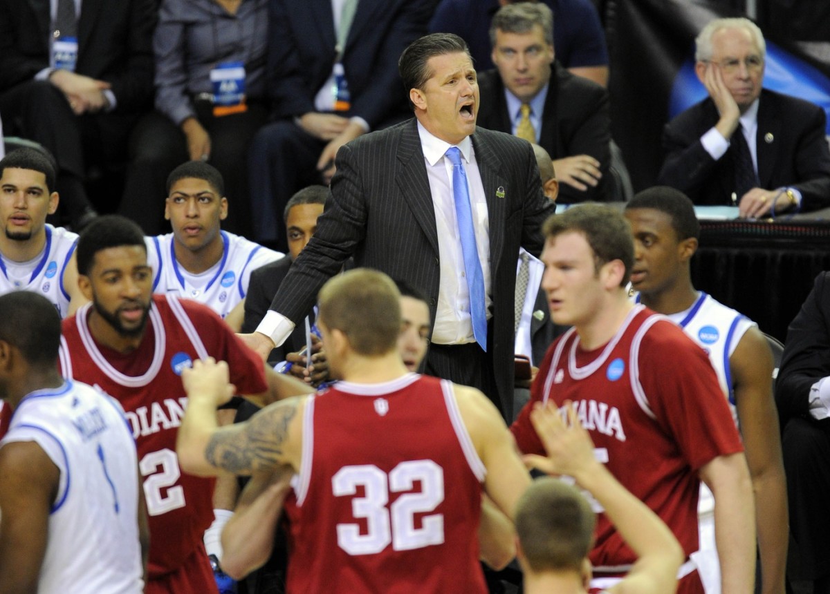 Kentucky Wildcats head coach John Calipari reacts on the sideline against the Indiana Hoosiers in the first half of the semifinals of the south region of the 2012 NCAA men's basketball tournament at the Georgia Dome.