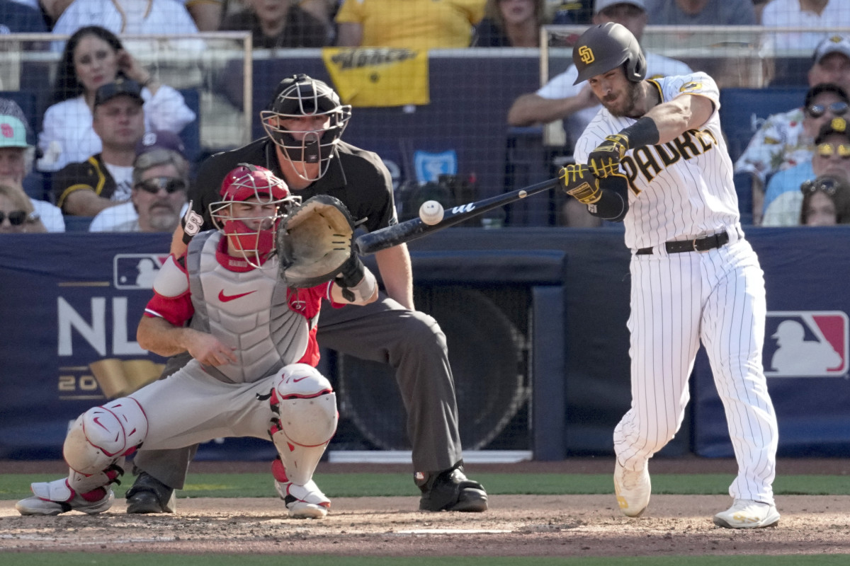 Padres catcher Austin Nola rips an RBI single off his brother, Phillies righthander Aaron Nola, in Game 2 of the NLCS.