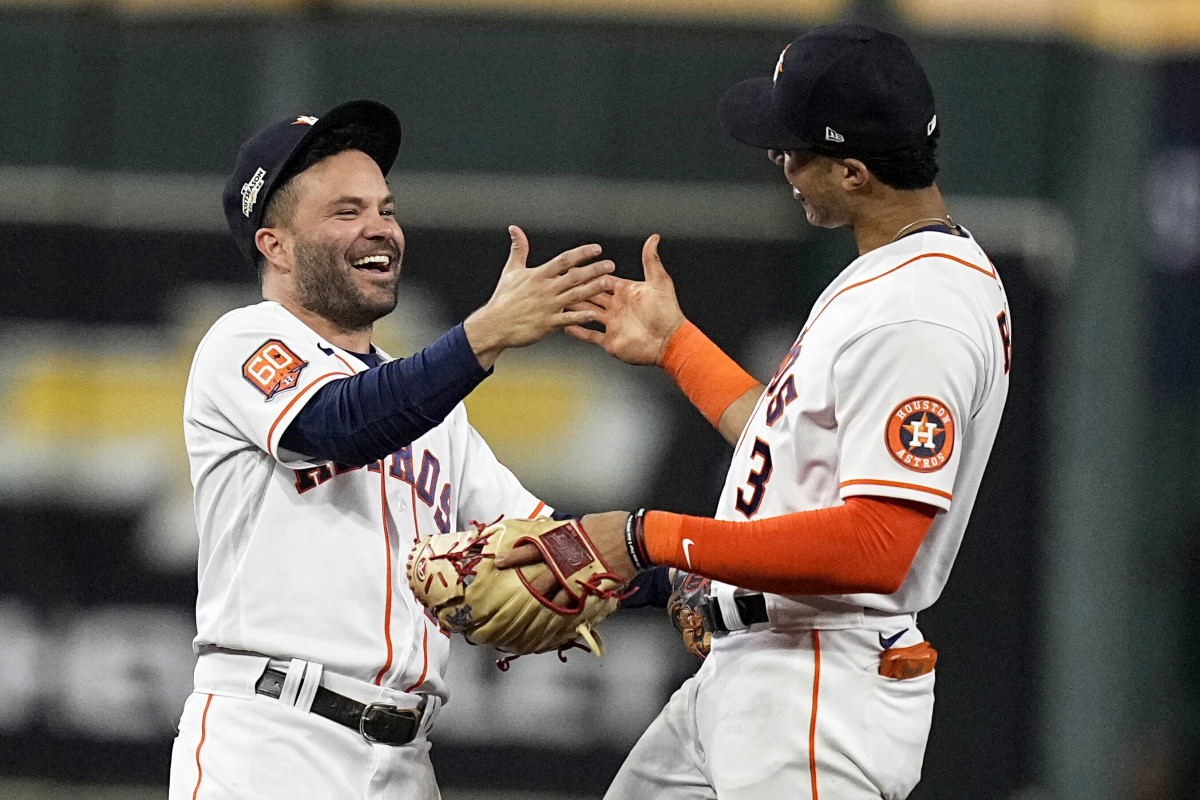 Jose Altuve and Jeremy Peña celebrate after the Astros beat the Yankees in Game 1 of the ALCS.